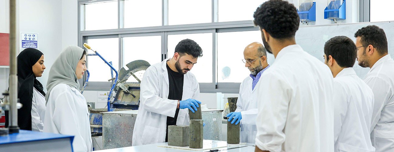 Engineering-students-conducting-a-concrete-materials-testing-experiment-in-a-modern-civil-engineering-laboratory